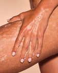 vanilla verve body scrub on skin